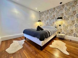 Appartements La Maison Des Cours - WIFI - Centre ville : photos des chambres
