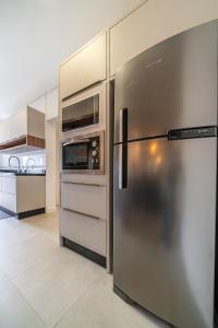 170- Apto elegante em Canto Grande com 02 suítes