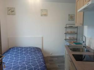 Appartements LE KENAV - STUDIO A 300 M DU PORT : photos des chambres