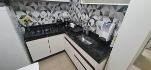 A lazer ou a trabalho fique em Botafogo em frente à Praia e ao Pao de Acúcar