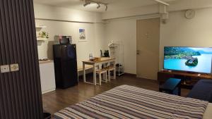 Papilukas Room Kalibata City - Studio Gold