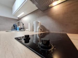 Appartements Meuble Flora pour voyageur pro - Centre, calme - Wi-Fi : photos des chambres