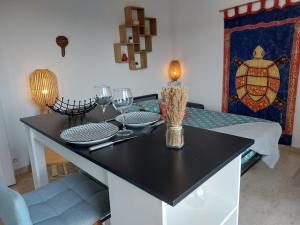 Appartements Studio Golf Riviera - Axelle Loc'Appart : photos des chambres