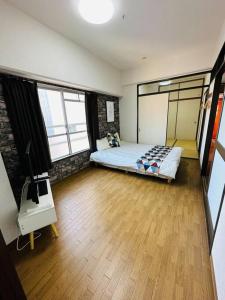 A Traditional Home with a View of Tsutenkaku