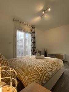Appartements La Feuillette - Cosy - Wifi - 4 personnes - Reve au Mans : photos des chambres