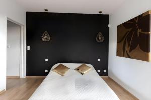 Maisons de vacances Le Dolce - Piscine - Jardin - 8pers - Reve au Mans : photos des chambres