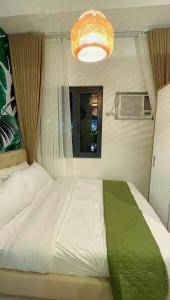 Samuel staycation in Smdc Green2 one studio unit