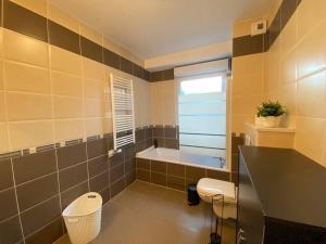 Appartements Mais Cottage, terrasse ensoleillee avec vue ! : photos des chambres