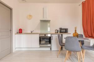 Appartements LE CORAIL - 1 chambre, ideal couple, parking, 10min Canal du Midi : photos des chambres