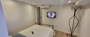 Maisons de vacances Maison 130m2, terrasse 70 m2 sud, 1a7 Pers, 3 chbres avec TV et clim : photos des chambres