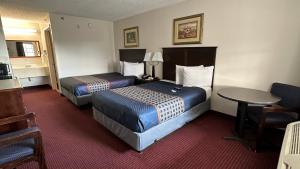 Double Room with Two Double Beds, Mobility Access and Bathtub with Grab Bars, Smoking room in Carom Inn Baton Rouge East