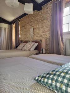 Appartements Le Clos du Botaniste : photos des chambres