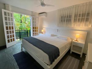 Juquehy - Condomínio de Frente para o Mar - Piscina Aquecida - Quadra de Tenis