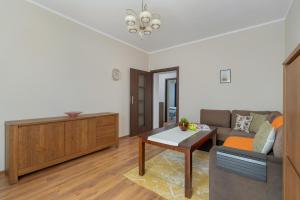 Traditionally Furnished Apartment with Balcony in Poznan by Renters