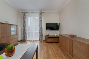 Traditionally Furnished Apartment with Balcony in Poznan by Renters