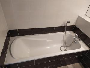 Appartements Beau studio neuf + parking et velo gratuit : photos des chambres