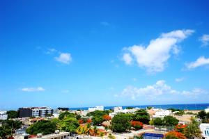 Apartment near the beach, rooftop, pool, sea view.