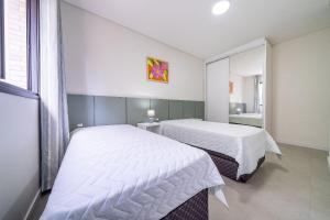 060 - Apartamento de dois dormitórios na praia de Bombas