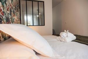 Appartements L'Escapade-Hypercentre-parking prive-refait a neuf : photos des chambres