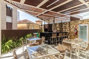Studio moderno em condomínio de luxo pé na areia