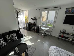 Maisons d'hotes Studio proche Paris et aeroport d-Orly : photos des chambres