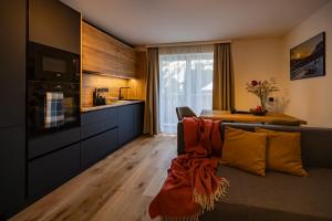 RIVERSIDE RAURIS APARTMENTS