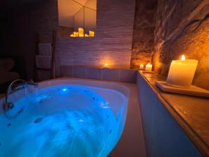 Appartements Chez Millouz - Triplex semi-troglodyte : photos des chambres