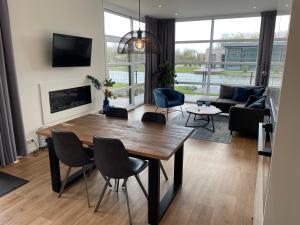 Marina Strandbad Chalet Aan het Water mit Zaun Haus Nr 134