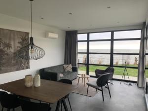 Enkhuizer Strand Chalet Meeresrauschen Erste Reihe mit Zaun Haus Nr 249