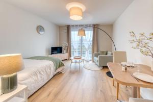 Appartements OVELIA Bourg-en-Bresse - Les Jardins de Voltaire : photos des chambres