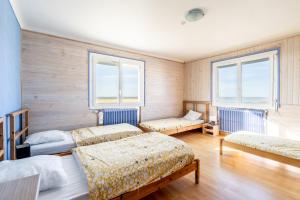 Maisons de vacances Maison vue sur mer 50m plage : photos des chambres