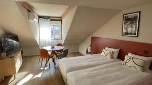 Appart'hotels Residence Les Baladines : photos des chambres
