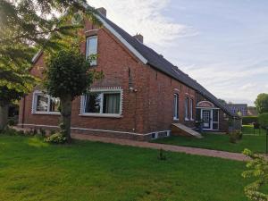 Ferienwohnung Nordsee Gulfhof Dornum - mit großem Garten