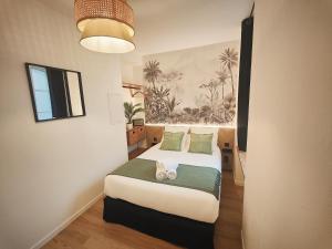 Appartements La Belle Mer by MRODBNB - Appart Neuf - Apercu Mer - 25m Plage & Resto - Cine - Cheminee - Popcorn : photos des chambres