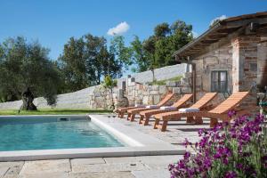 Villa Malini with Pool, Sauna and Fenced Garden