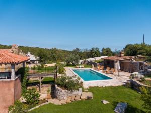 Villa Malini with Pool, Sauna and Fenced Garden