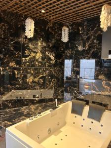 Appartements Esprit AFRICA, SPA et SAUNA de luxe : photos des chambres