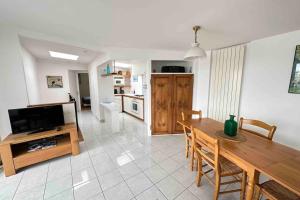 Maisons de vacances Charmante maison les pieds dans l'eau : photos des chambres