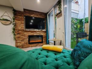 Appartements Le Quai Amienois - Romance Tropicale - SPA Romantique : photos des chambres