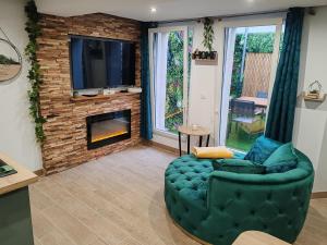 Appartements Le Quai Amienois - Romance Tropicale - SPA Romantique : photos des chambres