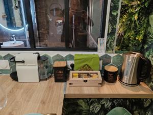 Appartements Le Quai Amienois - Romance Tropicale - SPA Romantique : photos des chambres