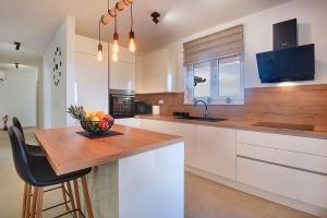 Ferienhaus mit Jacuzzi und Taverne mit Billard