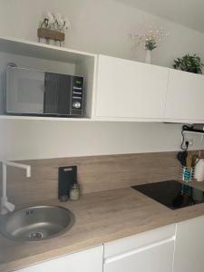 Appartements Studio spacieux proche gare et centre ville : photos des chambres