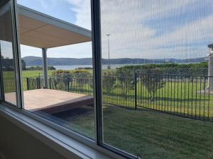 Serene Waterfront GuestHouse- Views & Vibes