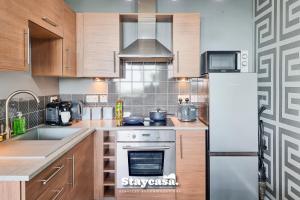 Luxury Sportcity Suite Amazing Views with Parking