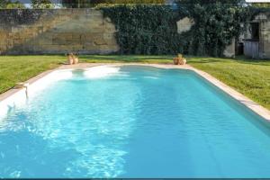 Villas Domaine avec piscine, aux portes de St Emilion : photos des chambres