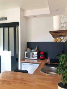 Rez de jardin climatisé, cosy, avec parking à Sanary - Les Amirantes