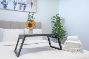 Stylish Getaway 2BD Basement by YMCA and South Health Campus Hospital