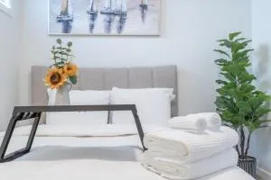 Stylish Getaway 2BD Basement by YMCA and South Health Campus Hospital - Shepard