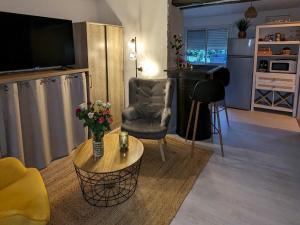 Appartements Maisonnette avec spa : photos des chambres